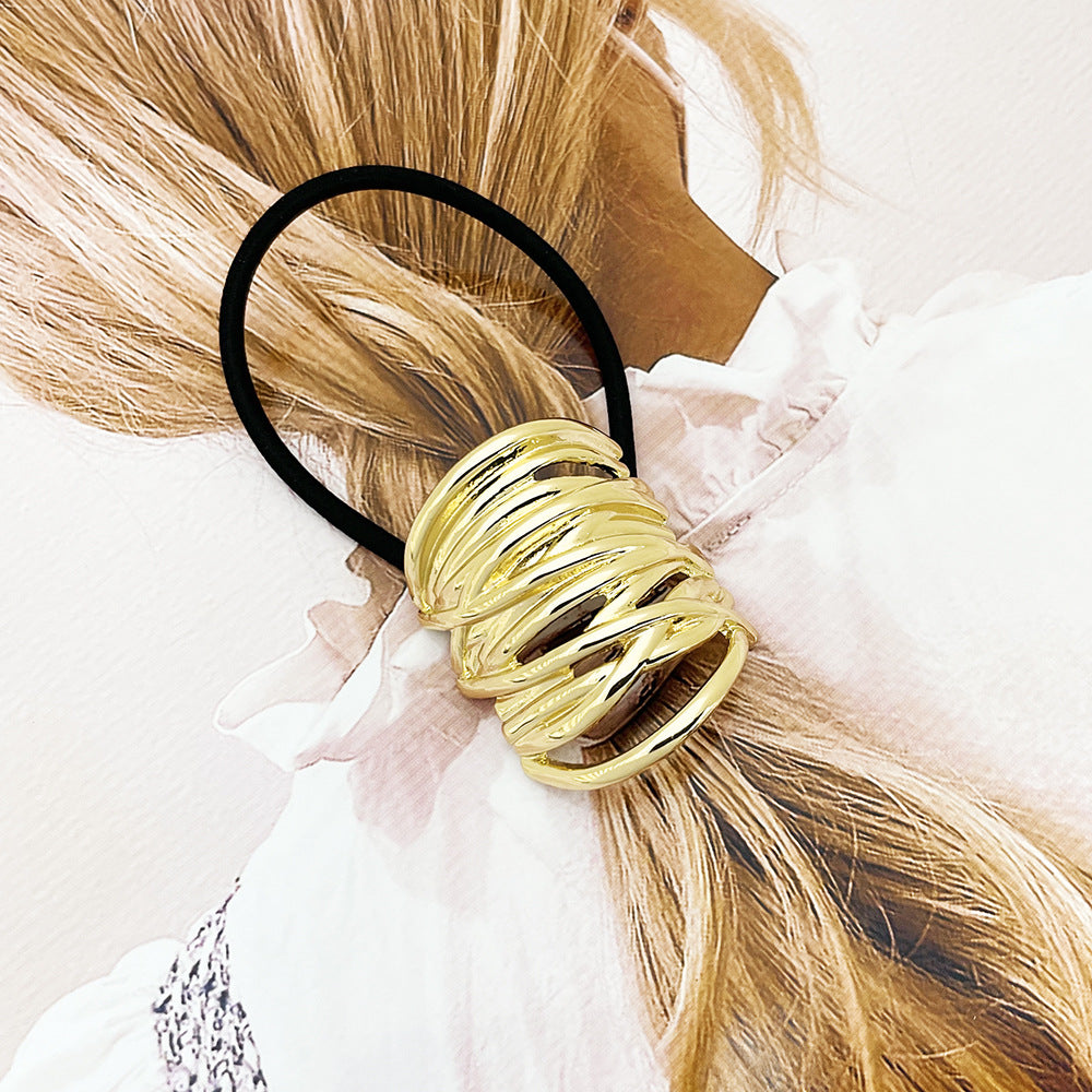 AZZ Chain Hair Tie in gold, worn in hair
